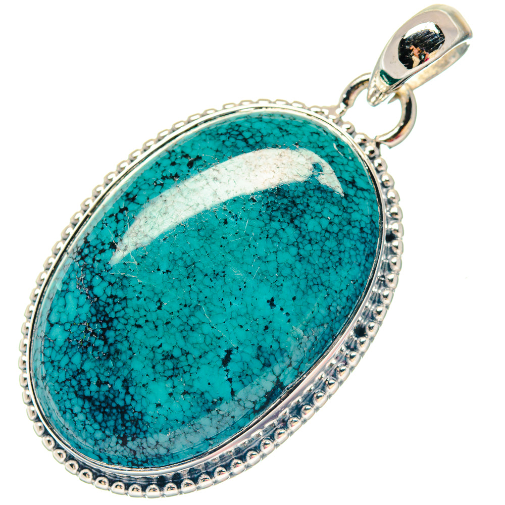 Oval turquoise pendant with textured 925 sterling silver bezel and loop bail