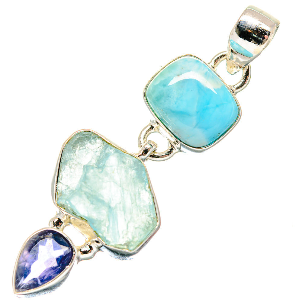 Sterling silver pendant with large oval light-blue stone, mint rough stone, and purple gem