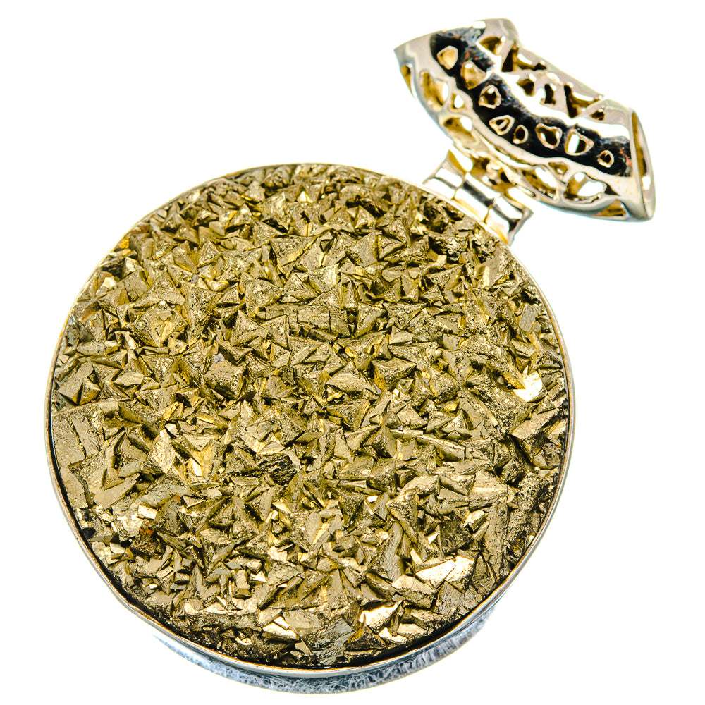 Rough pyrite disc pendant in sterling silver setting with open bail