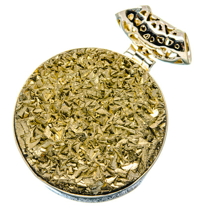 Rough pyrite disc pendant in sterling silver setting with open bail