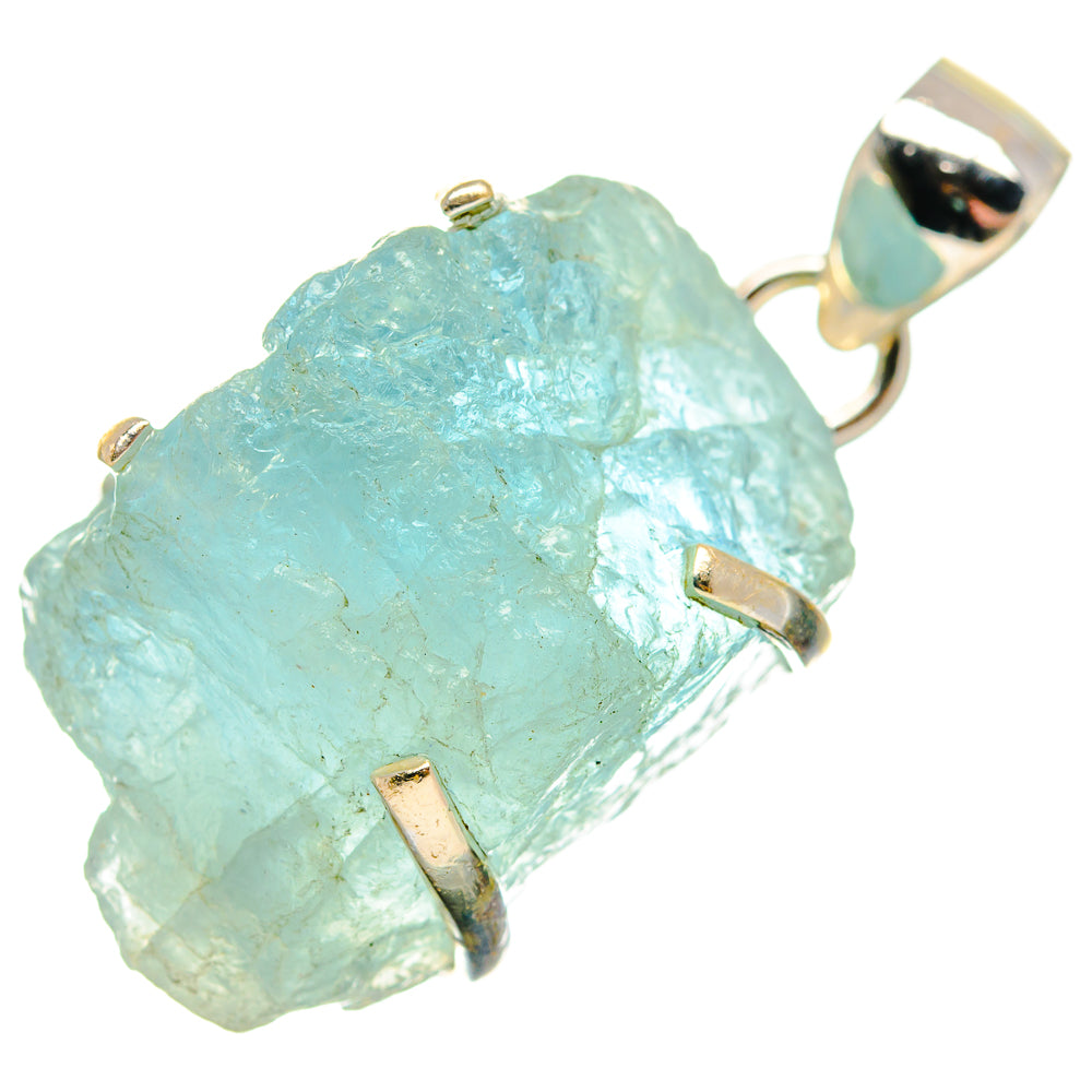 Rough aquamarine pendant with 925 sterling silver prongs and bail; light blue stone