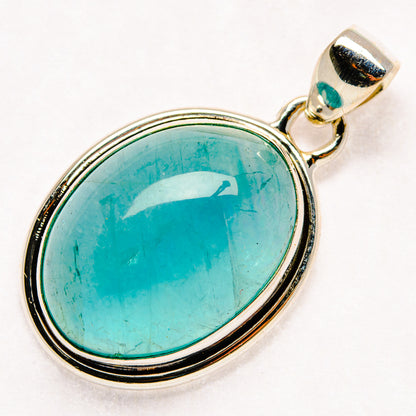 Oval aquamarine pendant in sterling silver bezel with bail