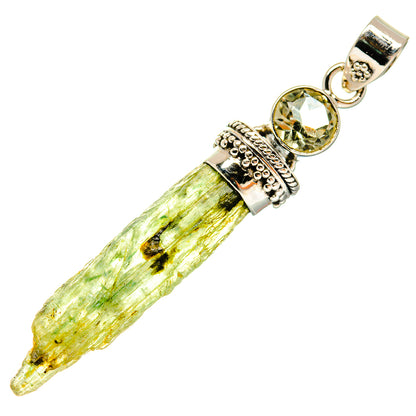 Rough peridot crystal pendant in 925 sterling silver with round green gemstone bezel