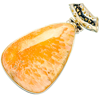 Teardrop scolecite pendant with orange peach stone and 925 sterling silver bezel.