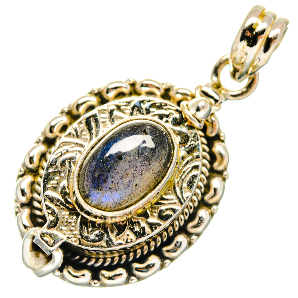 Oval labradorite poison pendant in ornate 925 sterling silver setting with top bail