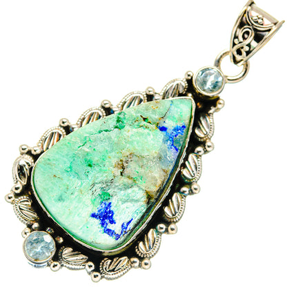 Rough azurite pendant in ornate 925 sterling silver with blue topaz accents