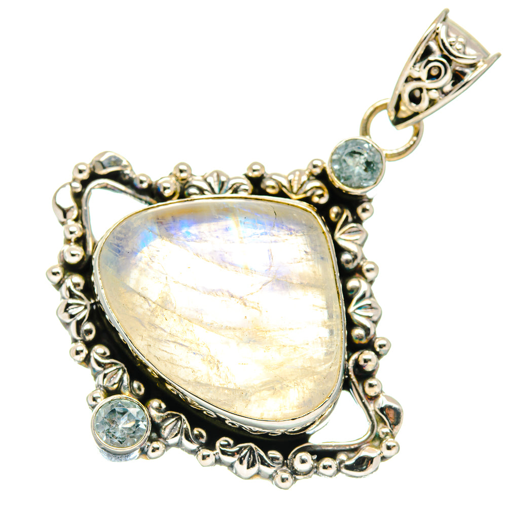 Opal-like moonstone pendant with blue topaz accents, ornate 925 sterling silver frame