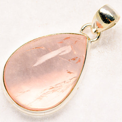 Rose quartz teardrop pendant in 925 sterling silver with bezel, light pink stone