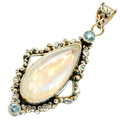Sterling silver teardrop pendant with blue round stones and ornate frame