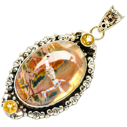 Oval jasper pendant with silver filigree, small round citrine stones, and top bail