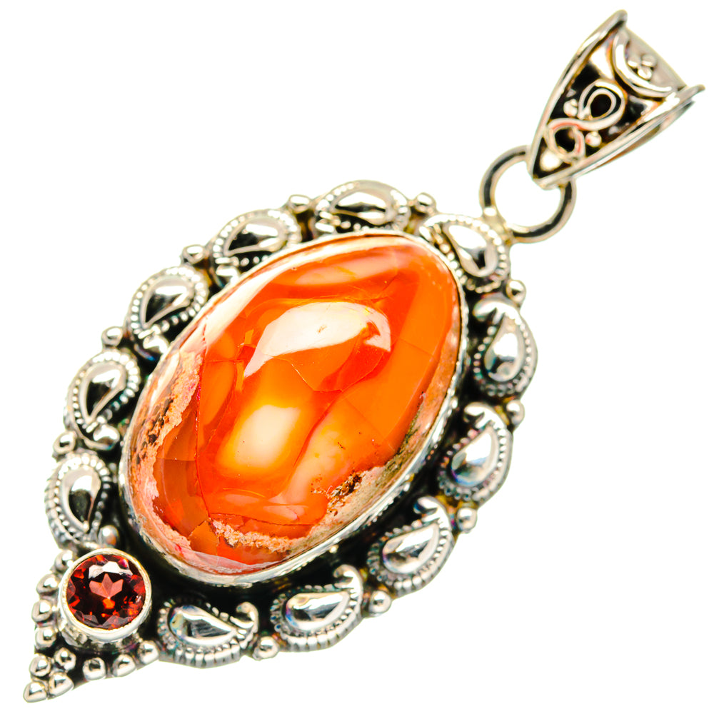 Sterling silver oval fire opal pendant with round garnet accents, ornate frame