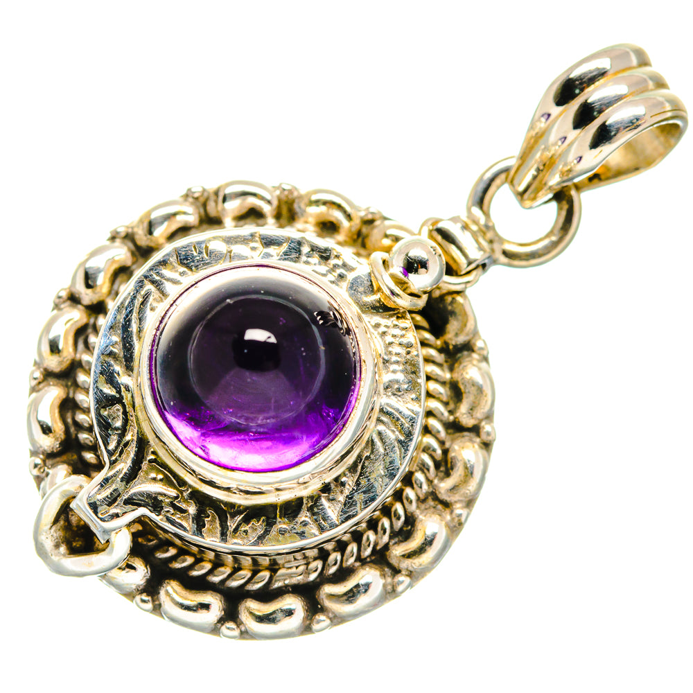 Sterling silver amethyst pendant with round purple cabochon and hanging bail, ornate frame