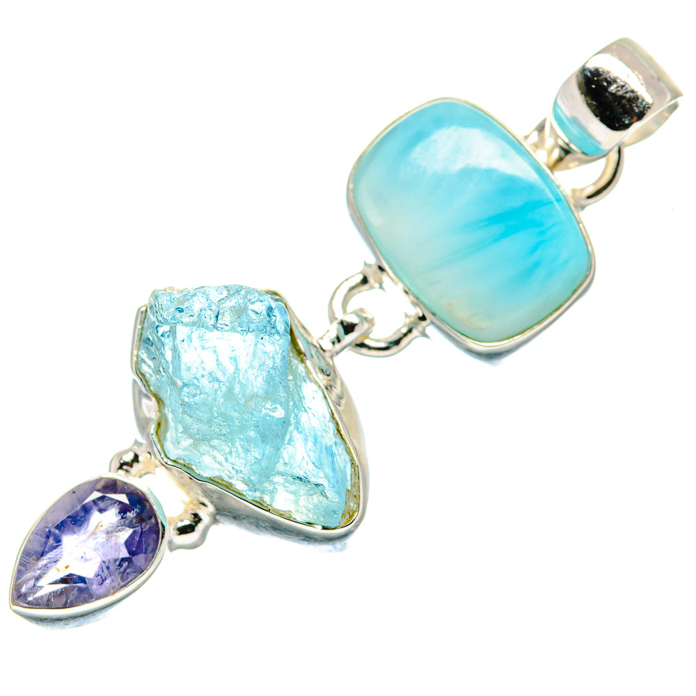 Sterling silver gemstone pendant with rectangular blue cabochon and rough blue stone, purple teardrop