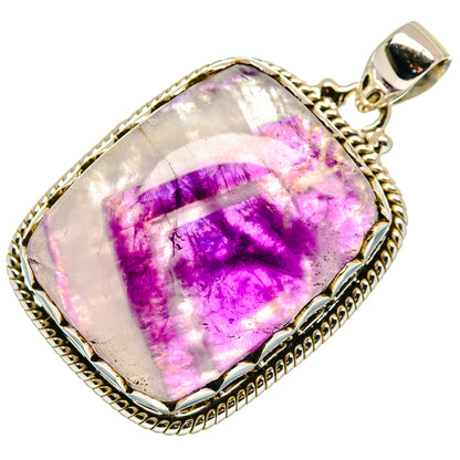 Amethyst pendant in 925 sterling silver bezel with purple gemstone cabochon