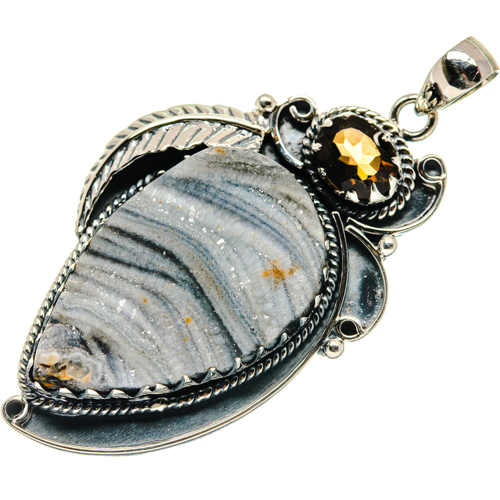 Oval blue-gray druzy stone pendant in sterling silver with black and amber accents
