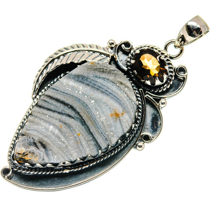 Oval blue-gray druzy stone pendant in sterling silver with black and amber accents