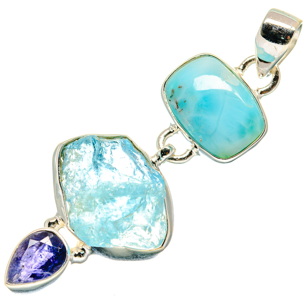 Sterling silver pendant with oval turquoise gemstone, rough light-blue stone, and purple accent