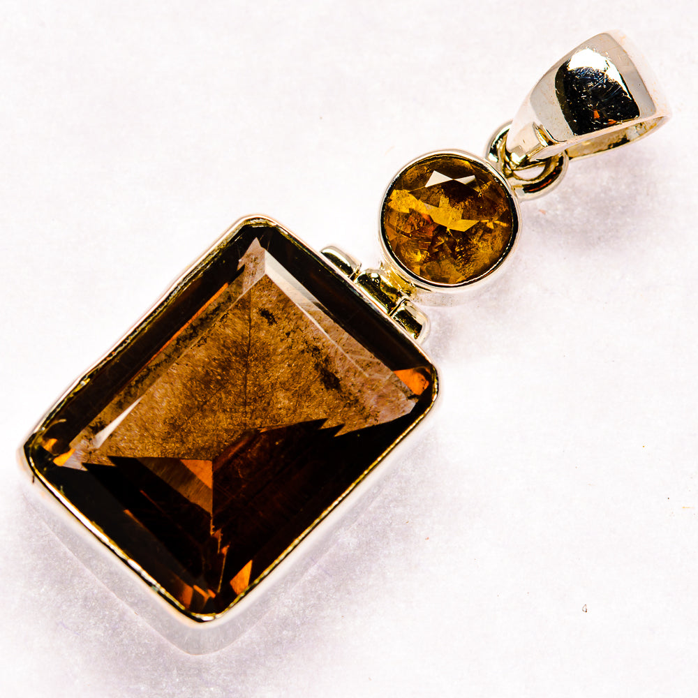 Smoky quartz pendant in 925 sterling silver with rectangular stone and round top bail
