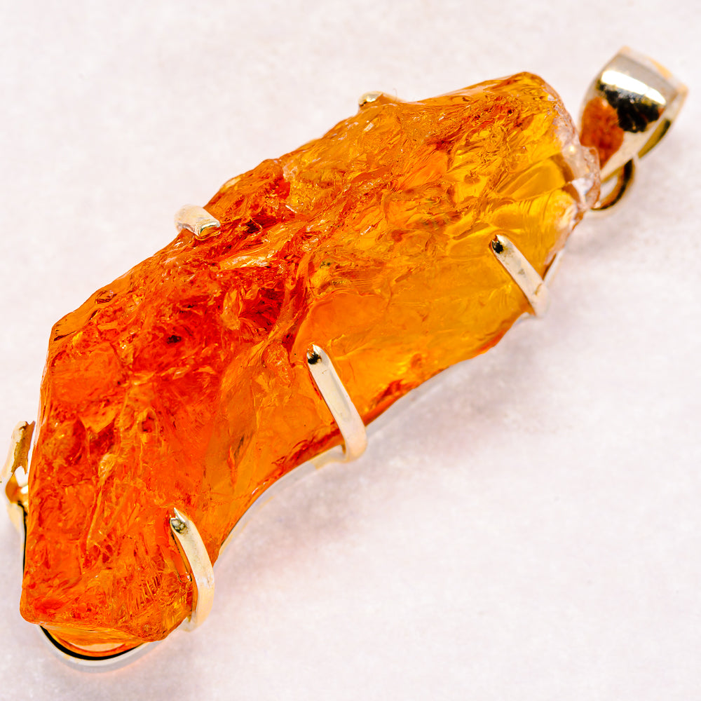 Rough orange citrine crystal pendant in 925 sterling silver bezel and bail