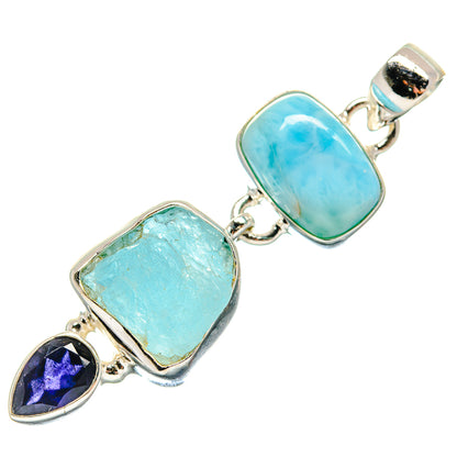 Sterling silver pendant with two light-blue rough stones and dark purple teardrop