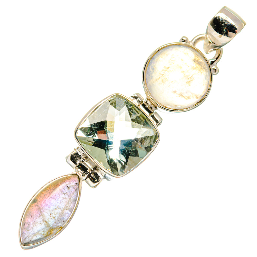 Sterling silver pendant with round opalescent gem, faceted green stone, and pink marquise gems