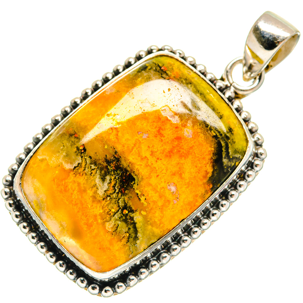 Sterling silver pendant with oval yellow-orange jasper cabochon and beaded bezel
