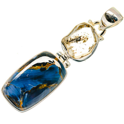 Sterling silver pendant with long blue-and-gold stone and clear yellow stone, bail