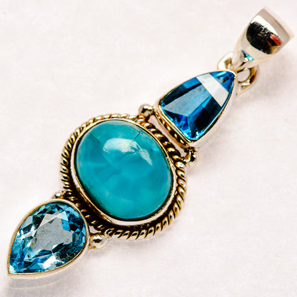 Sterling silver pendant with oval turquoise larimar and blue topaz teardrop and marquise