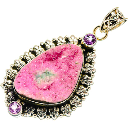 Oval pink druzy calcite pendant in ornate silver with purple amethyst side stones
