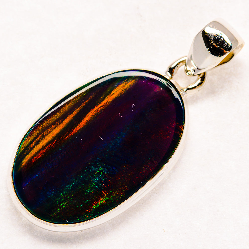 Oval opal pendant in 925 sterling silver, bezel-set with rainbow shimmer