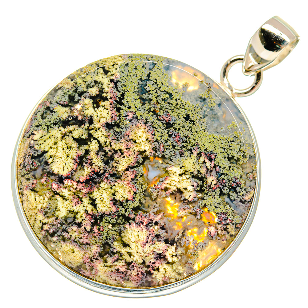 Round plume agate pendant in silver setting, colorful speckled stone with natural veins.