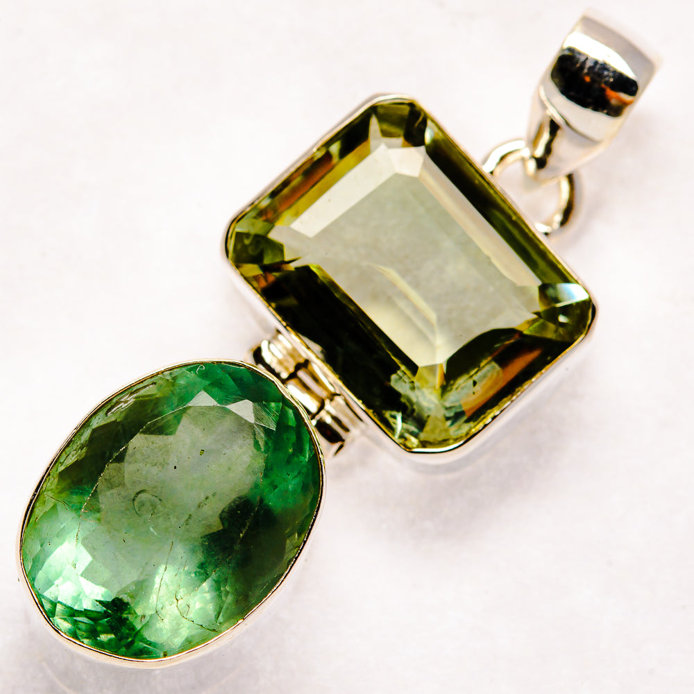 Sterling silver pendant with faceted green amethyst and green oval stone, top bail