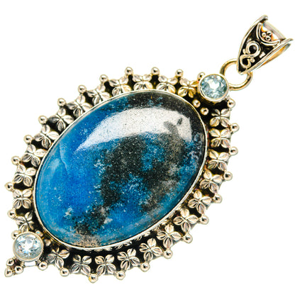 Oval blue topaz pendant in sterling silver with floral filigree and light-blue accents