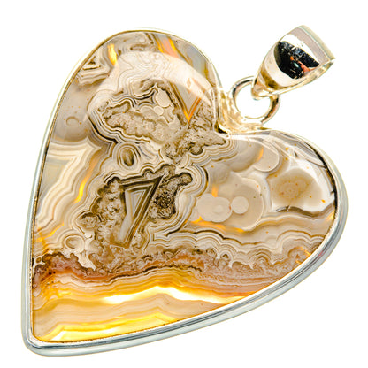 Heart-shaped lace agate pendant in sterling silver, gold-and-cream swirls with hanger bail