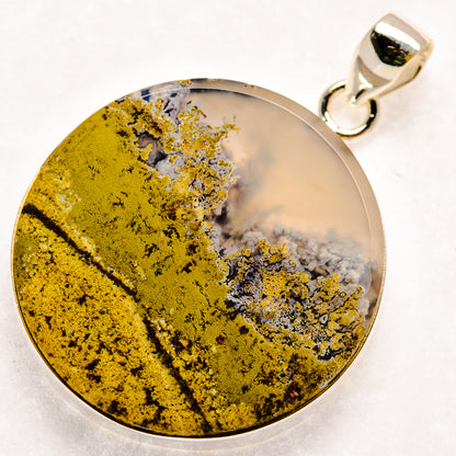 Sterling silver agate pendant with round cabochon, yellow plume and gray-blue veining