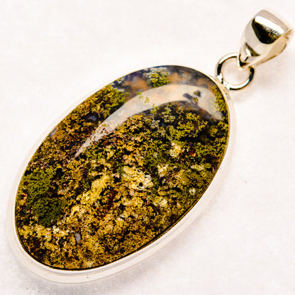 925 sterling silver plume agate pendant with teardrop cabochon, yellow-green speckled mineral design
