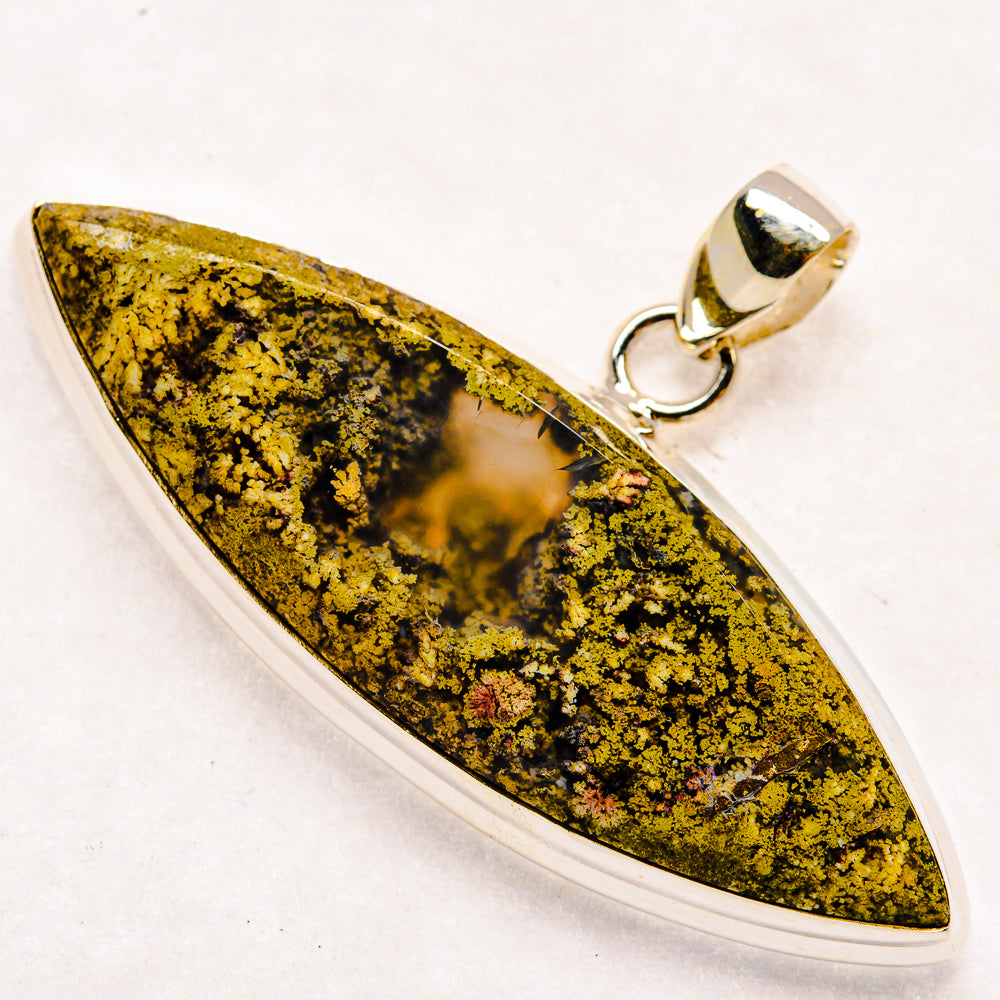 Plume agate pendant with yellow-green marbled stone, sterling silver bezel and bail