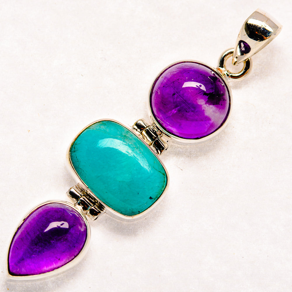 Sterling silver pendant with oval amethyst and larimar stones, side-by-side bezel setting