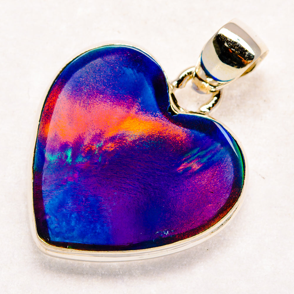 Heart-shaped opal pendant in sterling silver, vivid blue and purple iridescence