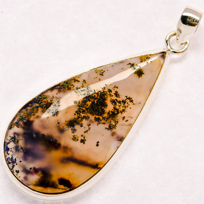 Teardrop plume agate pendant in 925 sterling silver setting, with round bail