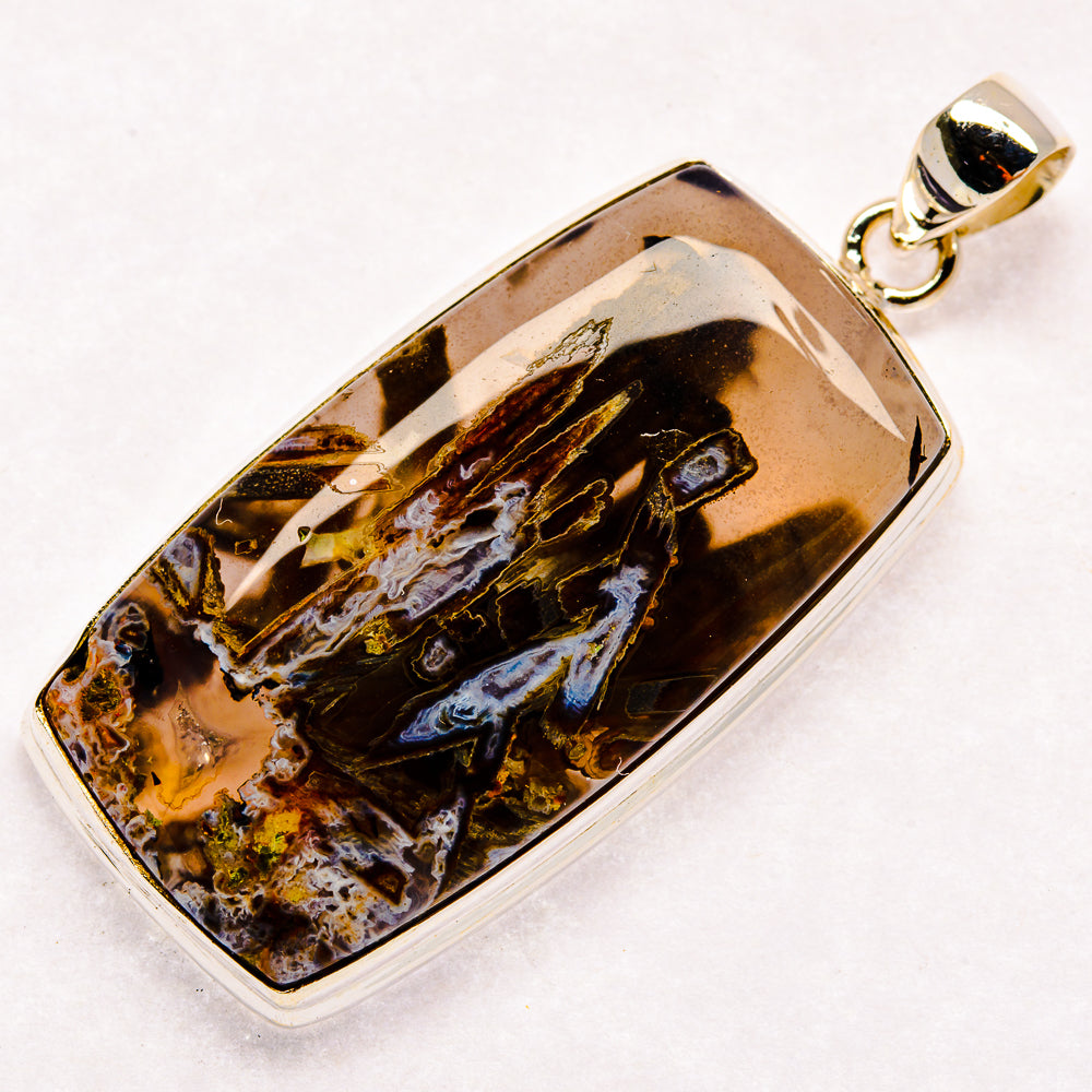 Rectangular agate pendant in 925 sterling silver bezel, dark amber and gold veining
