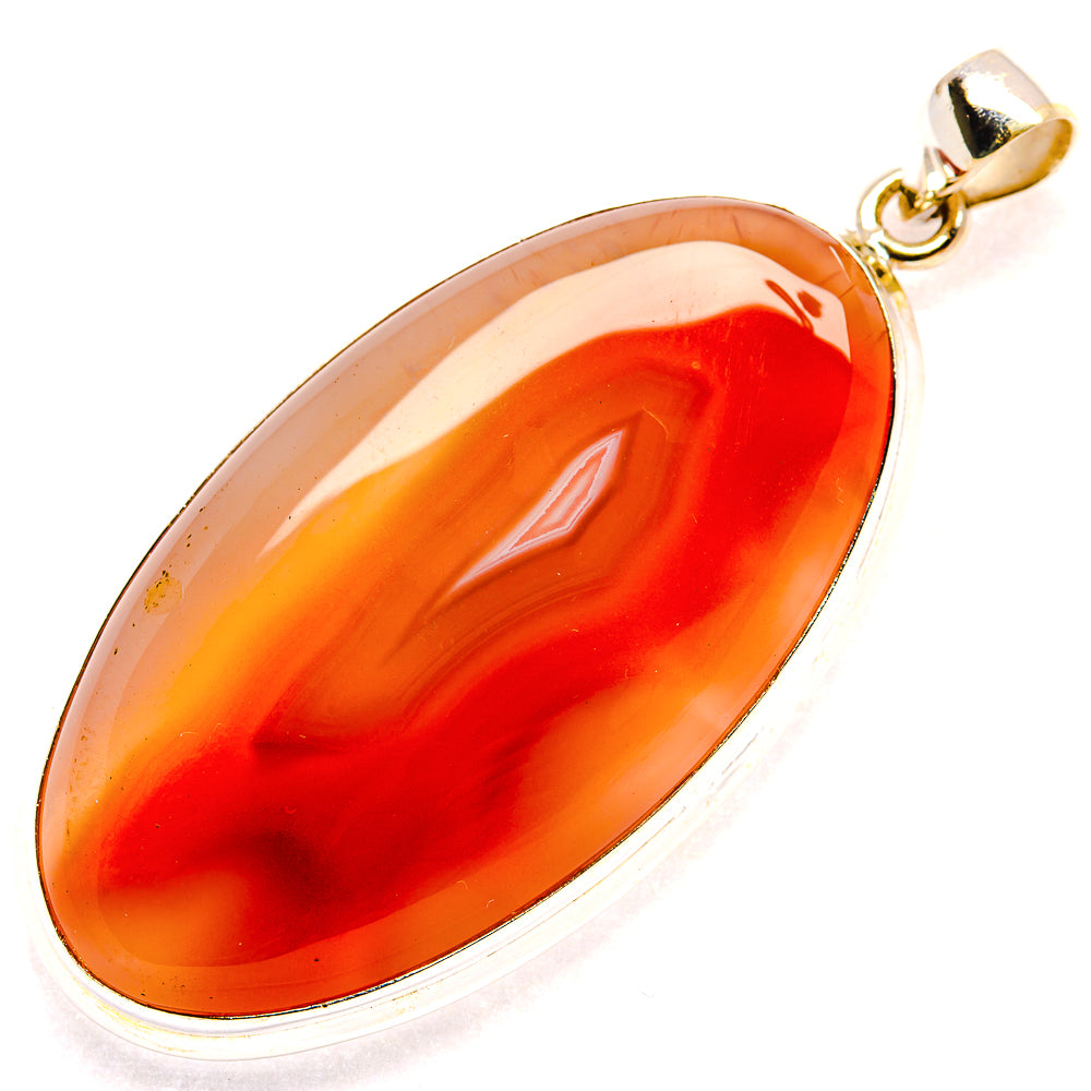 Large oval orange agate pendant with 925 sterling silver bail and bezel setting.