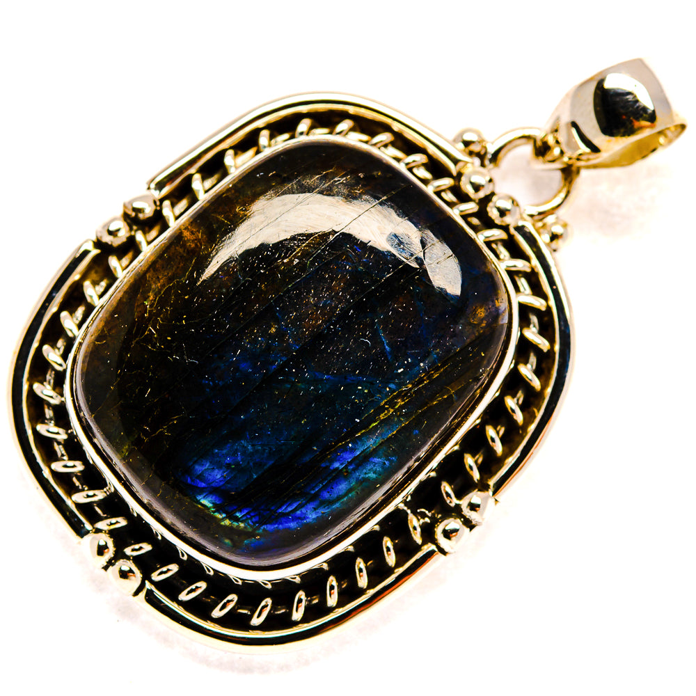 Labradorite pendant with oval blue-sparkle gemstone in ornate silver setting