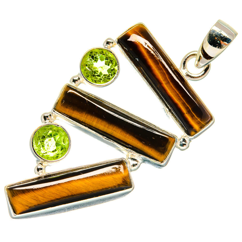 Sterling silver tiger eye pendant with three green peridot round stones in bezel settings