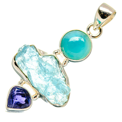 Sterling silver pendant with round turquoise stone, rough aquamarine, and amethyst triangle