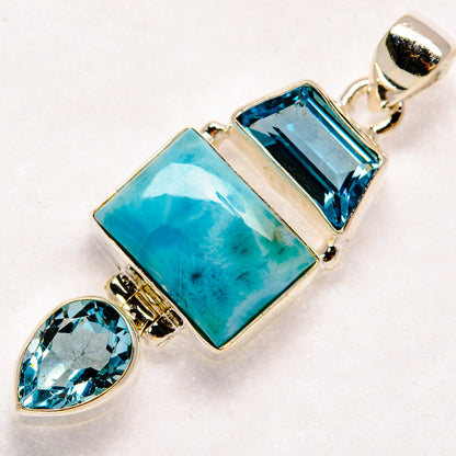 925 sterling silver pendant with rectangular blue stones and teardrop light-blue gemstone