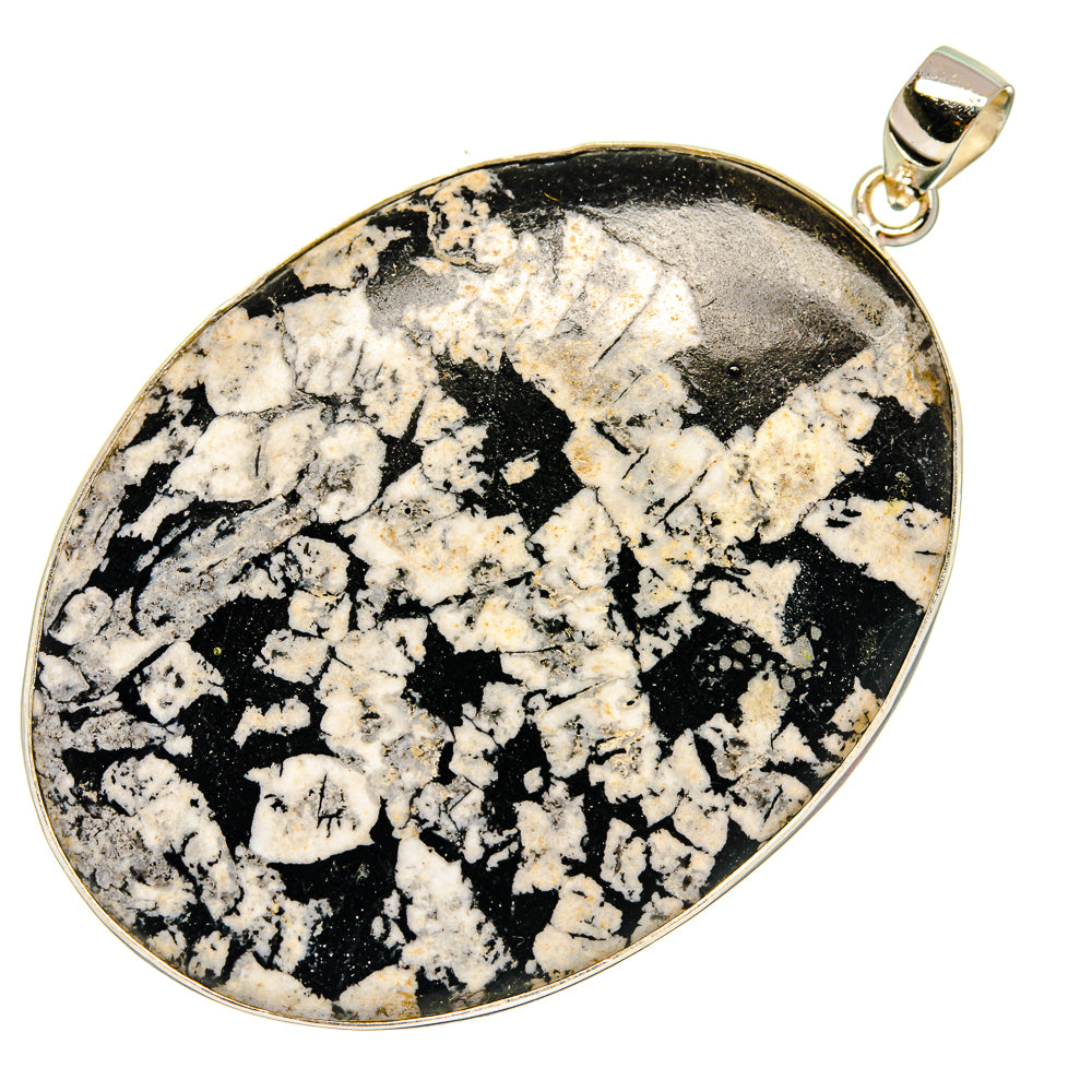 Chrysanthemum stone pendant with silver bail, teardrop black-and-white speckled cabochon