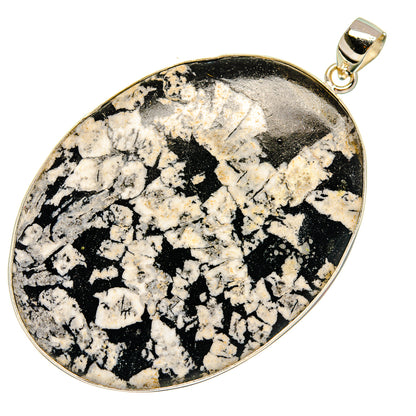 Chrysanthemum stone pendant with silver bail, teardrop black-and-white speckled cabochon