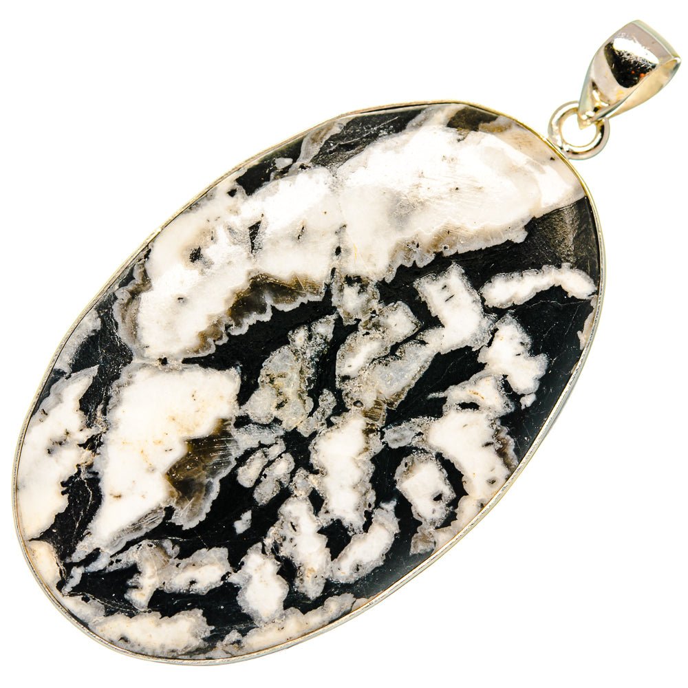925 sterling silver oval pendant with black-and-white chrysanthemum stone and gold bezel