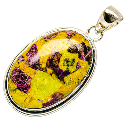 Sterling silver atlantisite oval pendant with bail, yellow cabochon stone and purple flecks